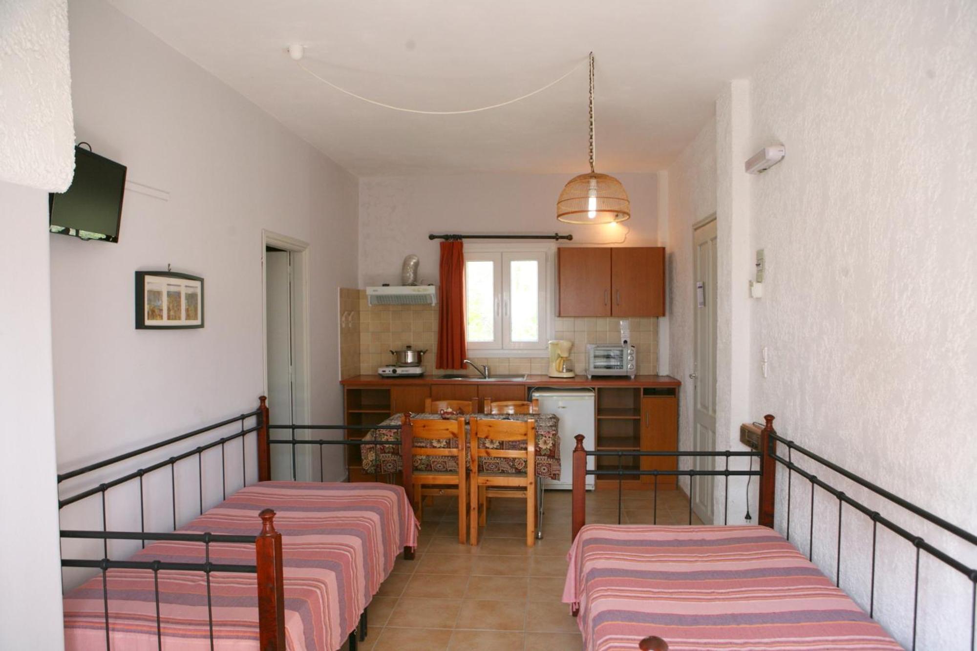 9 Musses Hotel Apartments Skala Mistegnon Quarto foto
